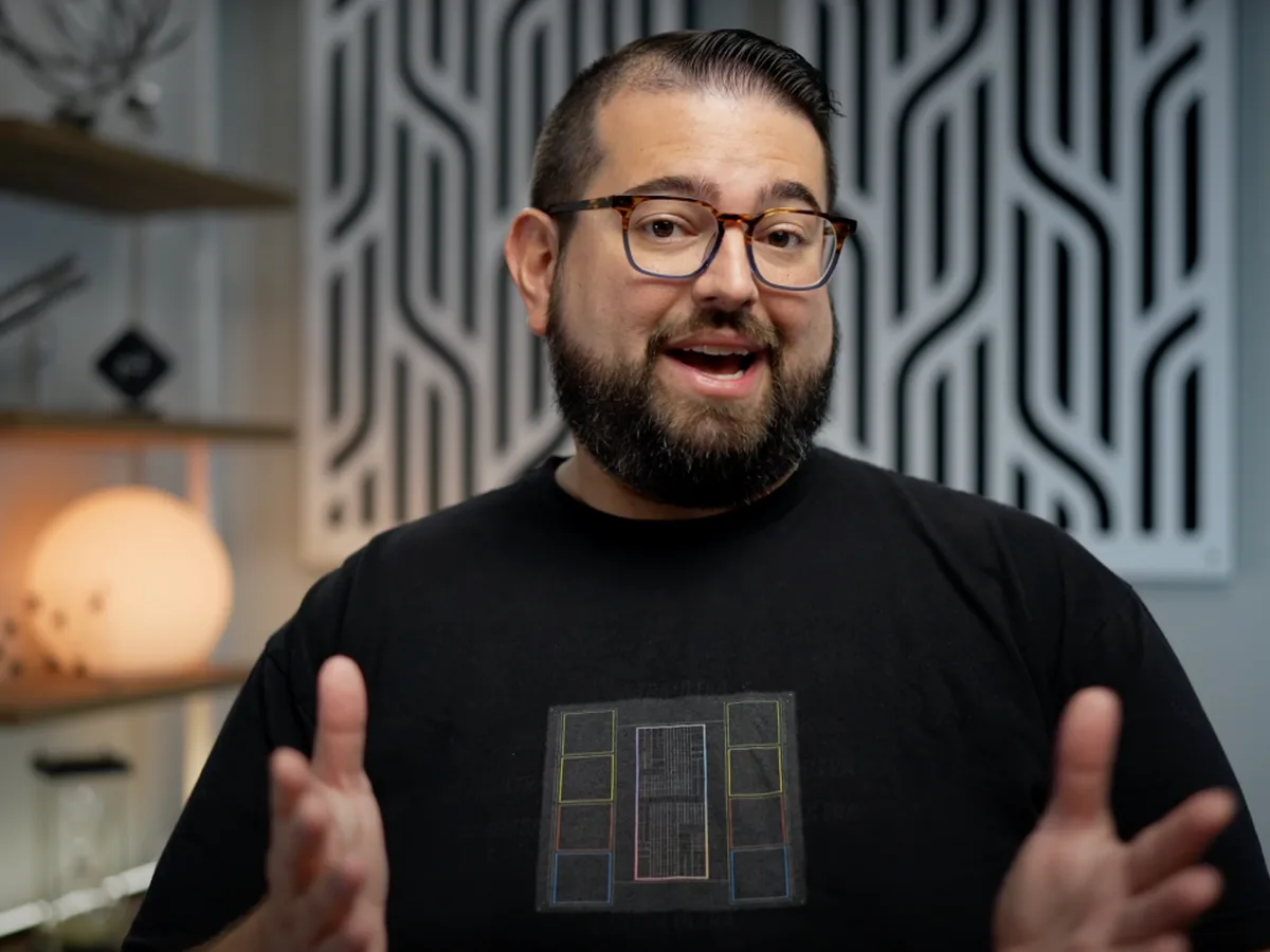 A creator talking to the camera in his studio